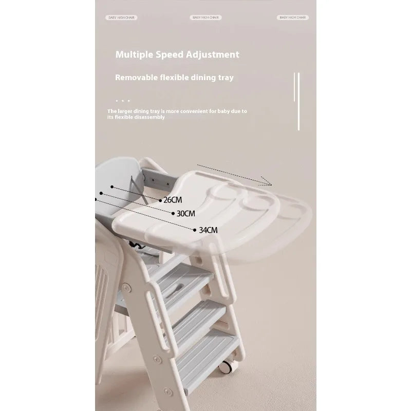 White high chair with a detachable tray on a light background