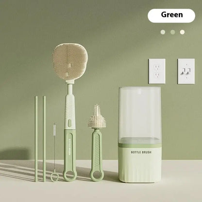 Green kitchen cleaning brush set with packaging on a green background