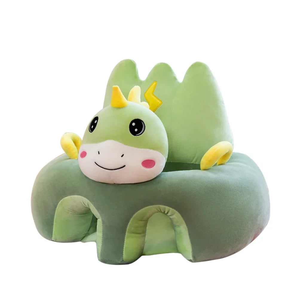 Green dragon-shaped plush chair on a white background