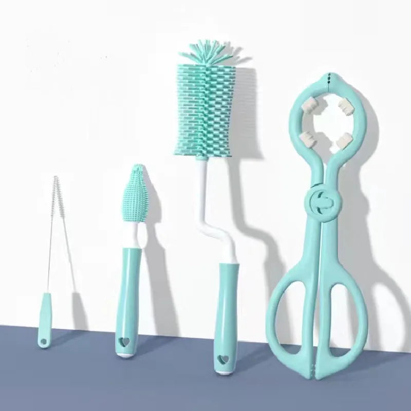Set of four turquoise cleaning brushes on a white background