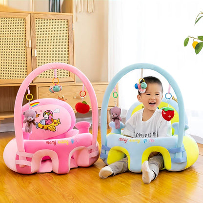 Two baby activity centers, one pink and one blue, with a child sitting inside the blue one.