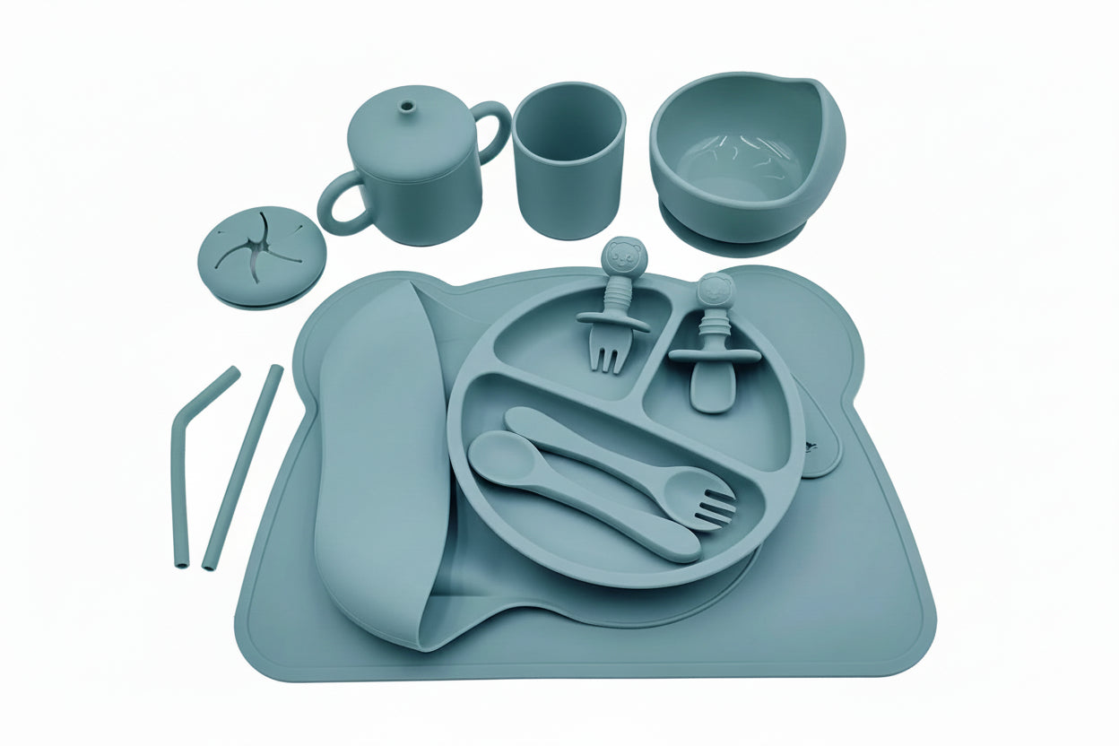 Blue children's dining set with tray, cups, bowl, and utensils on a white background.
