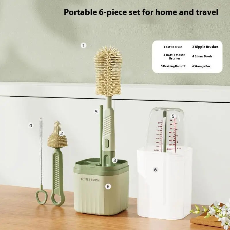 Portable 6-piece cleaning set with bottle brush, nipple brushes, and storage box on a wooden surface.