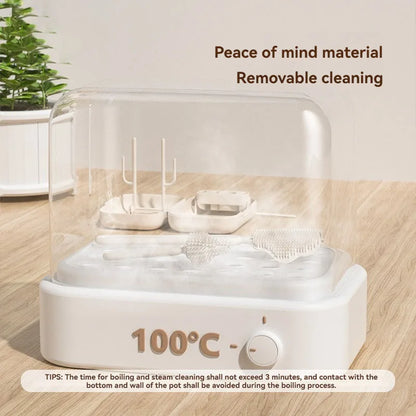 White electronic device with a clear dome on a wooden surface, featuring text about material and cleaning.