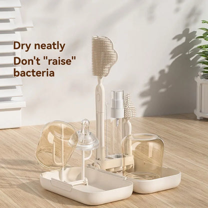 Beige and white baby bottle cleaning set on a wooden surface with text overlay.