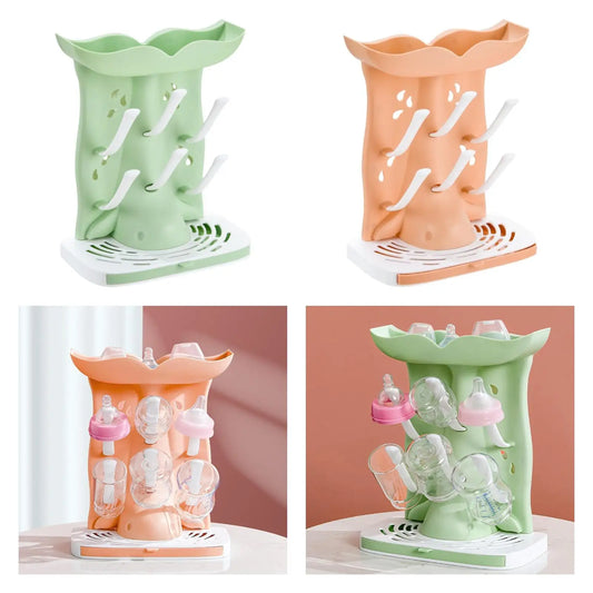 Two green and two orange bottle drying racks with bottles on a white background