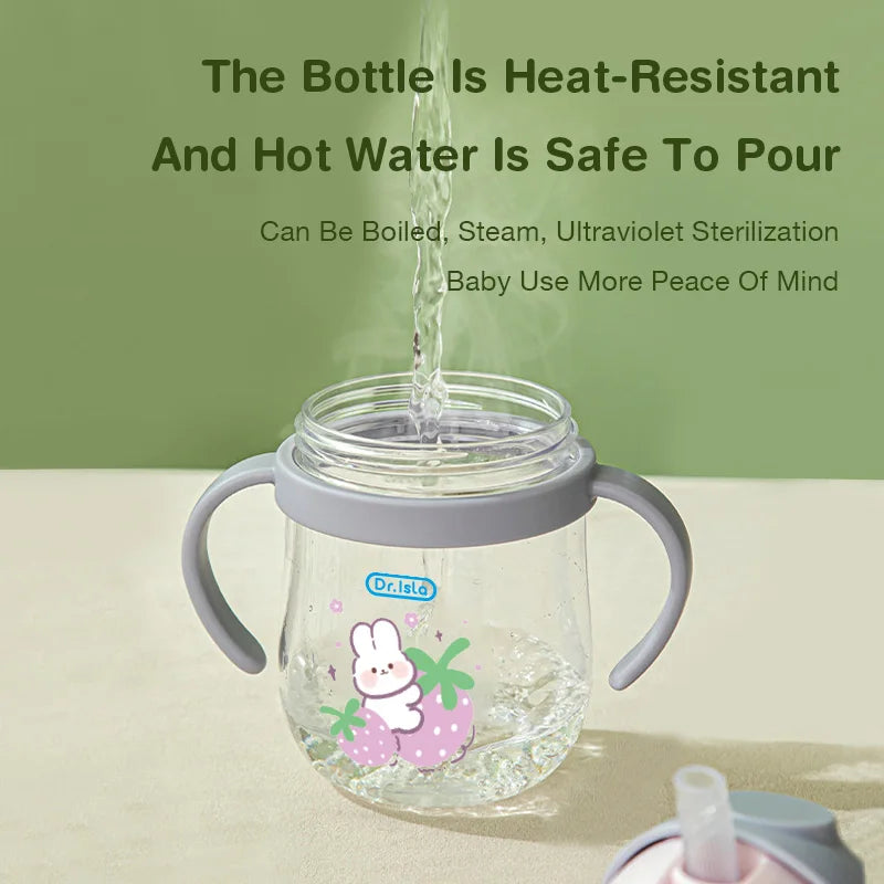 Heat-resistant bottle with steam rising from it on a beige surface with green background