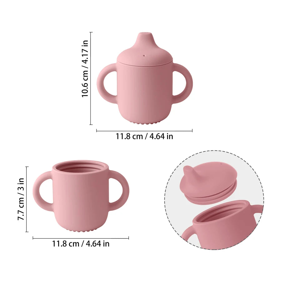 Pink sippy cup with measurements on a white background