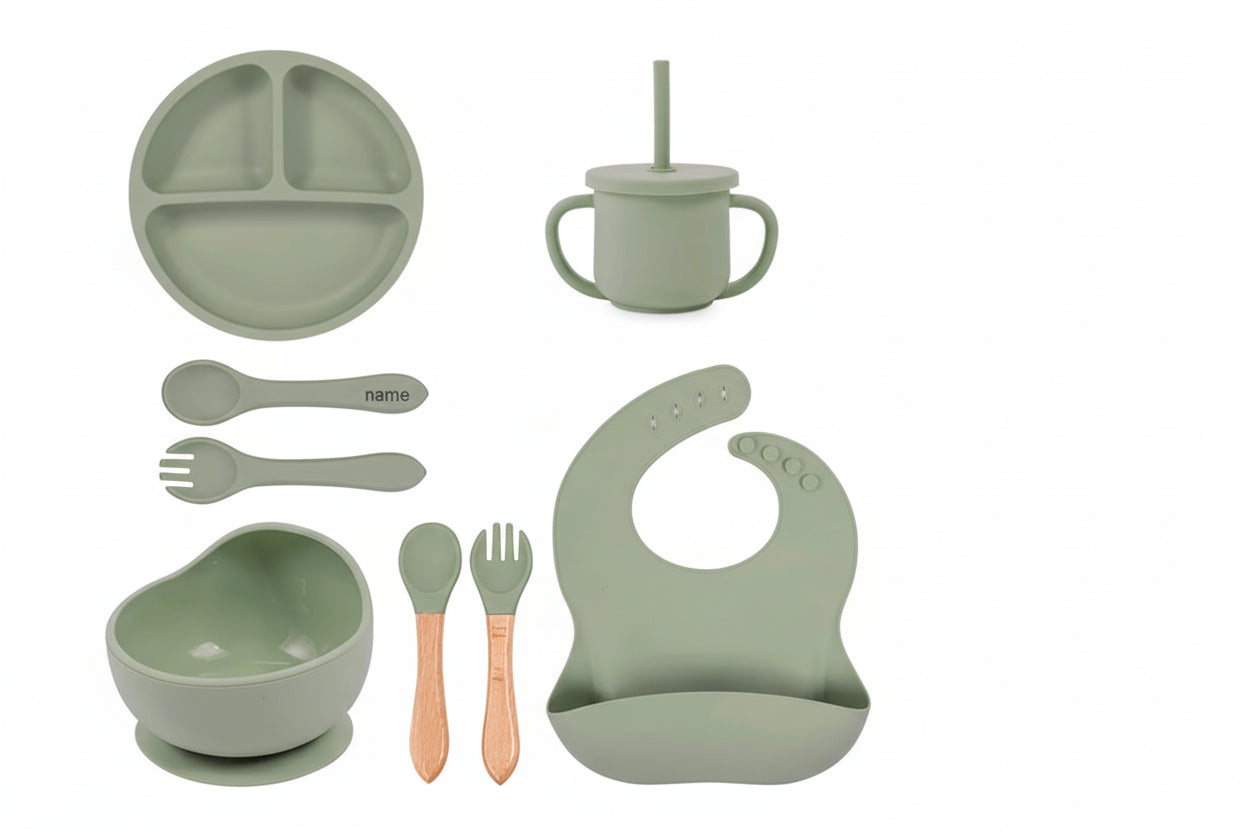 Green baby set  on a white background