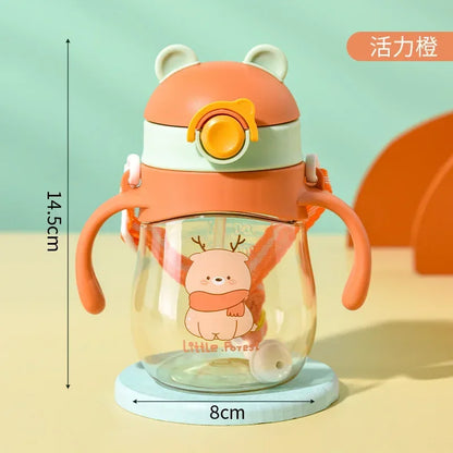 Children's water bottle with cartoon design and measurements on a light green background